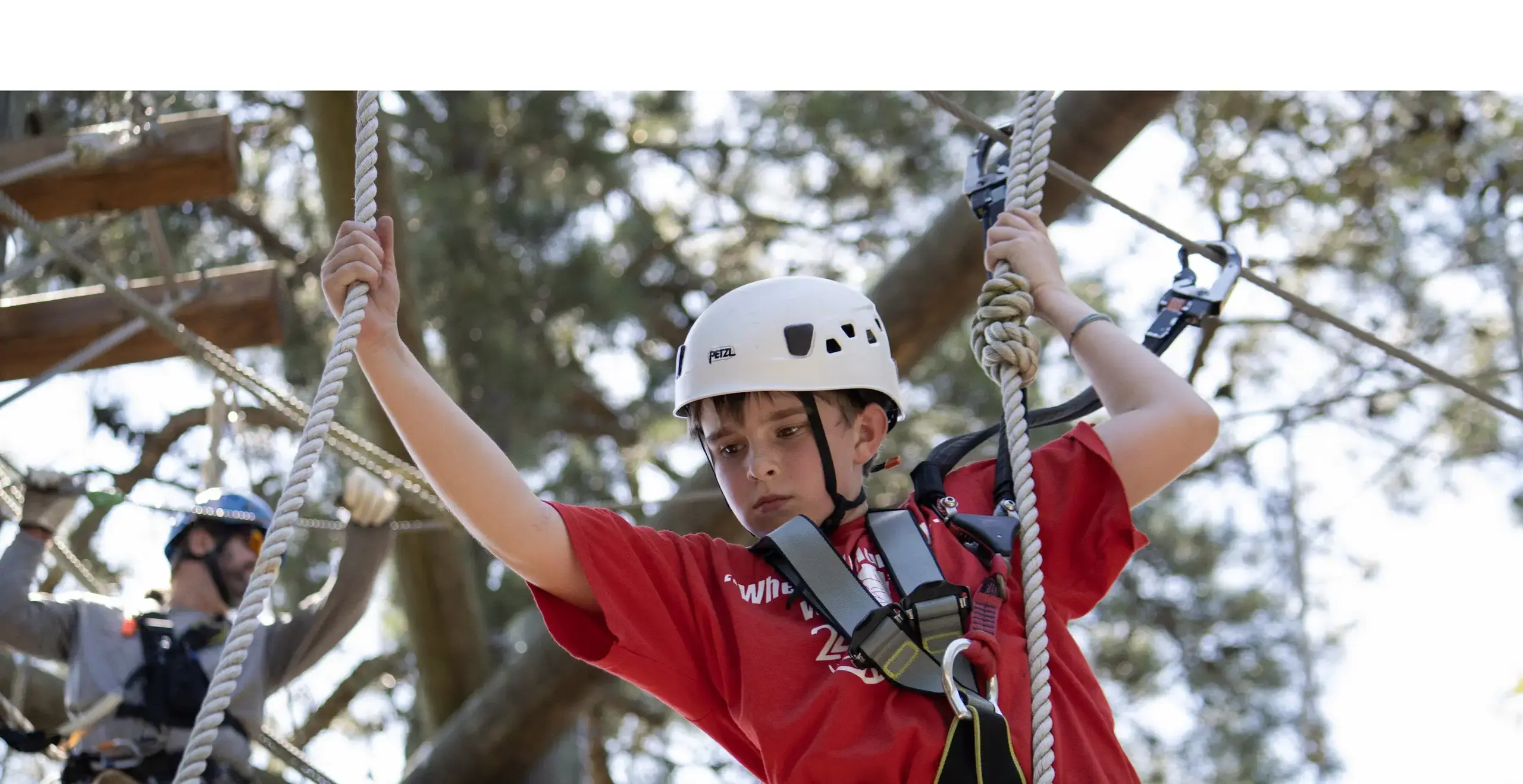 Student climbing outdoors