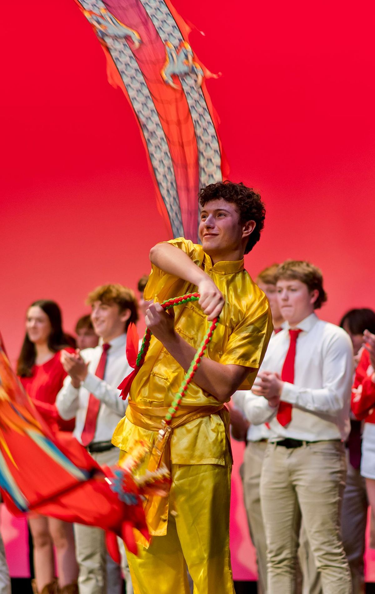 Student engaging in a cultural performance