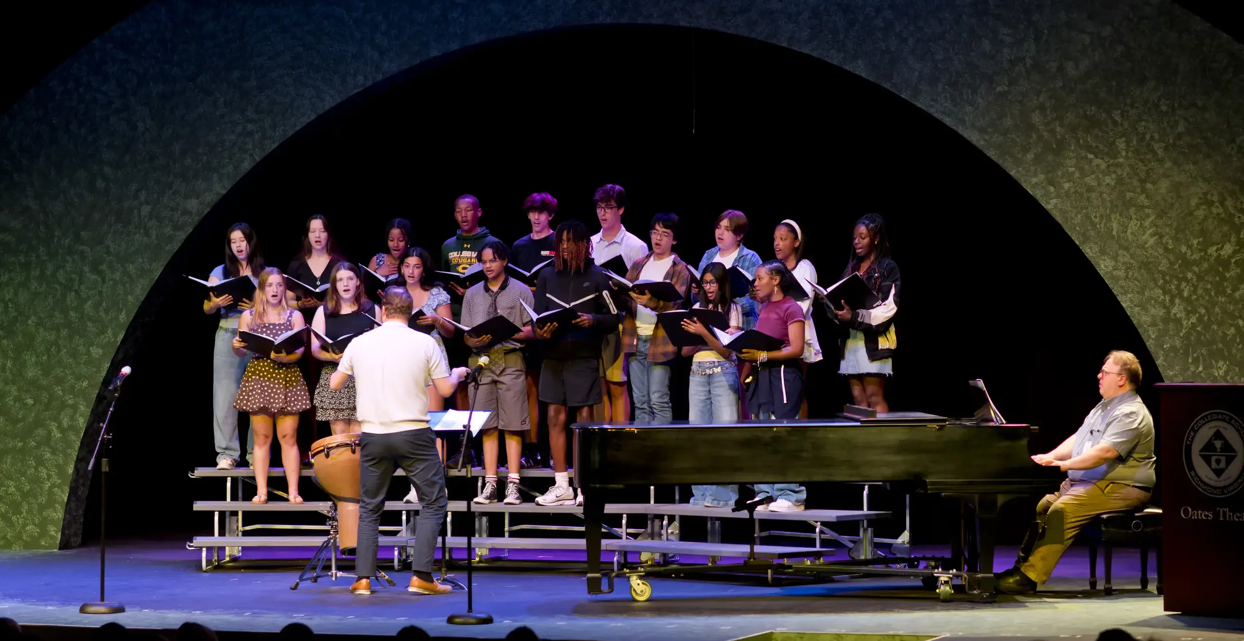 Choir group performing on stage