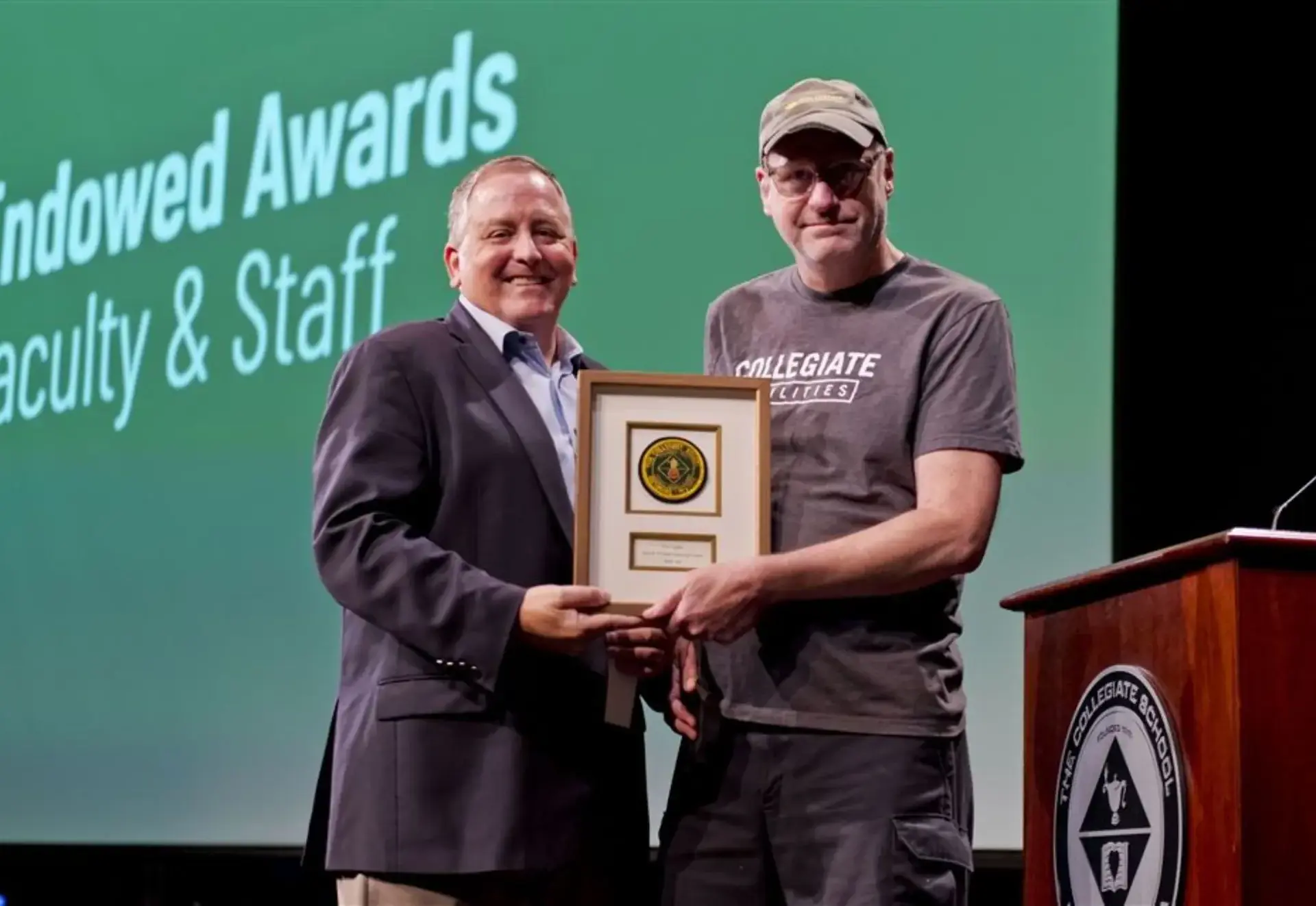 teacher receiving an award