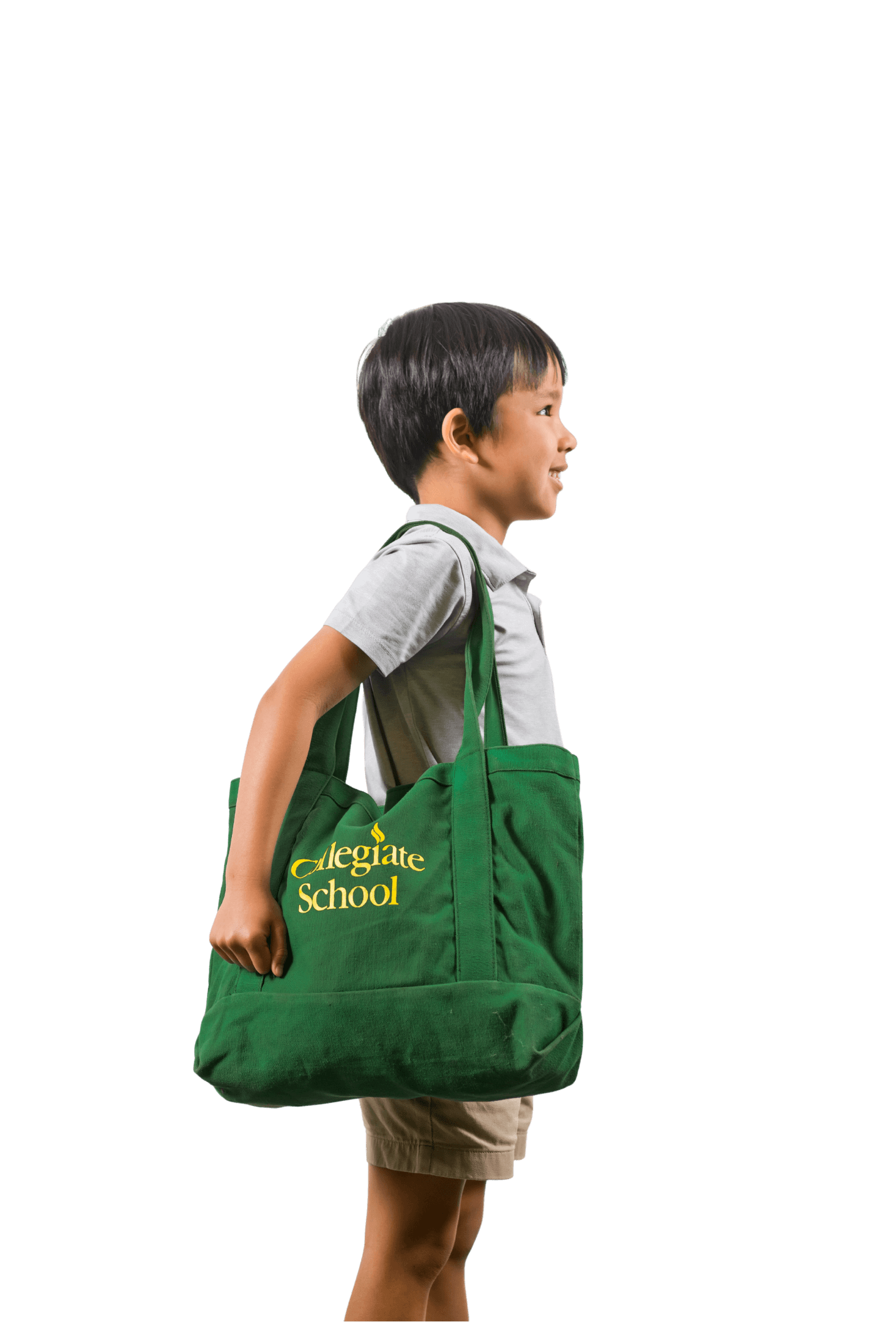 Lower school student carrying a tote bag