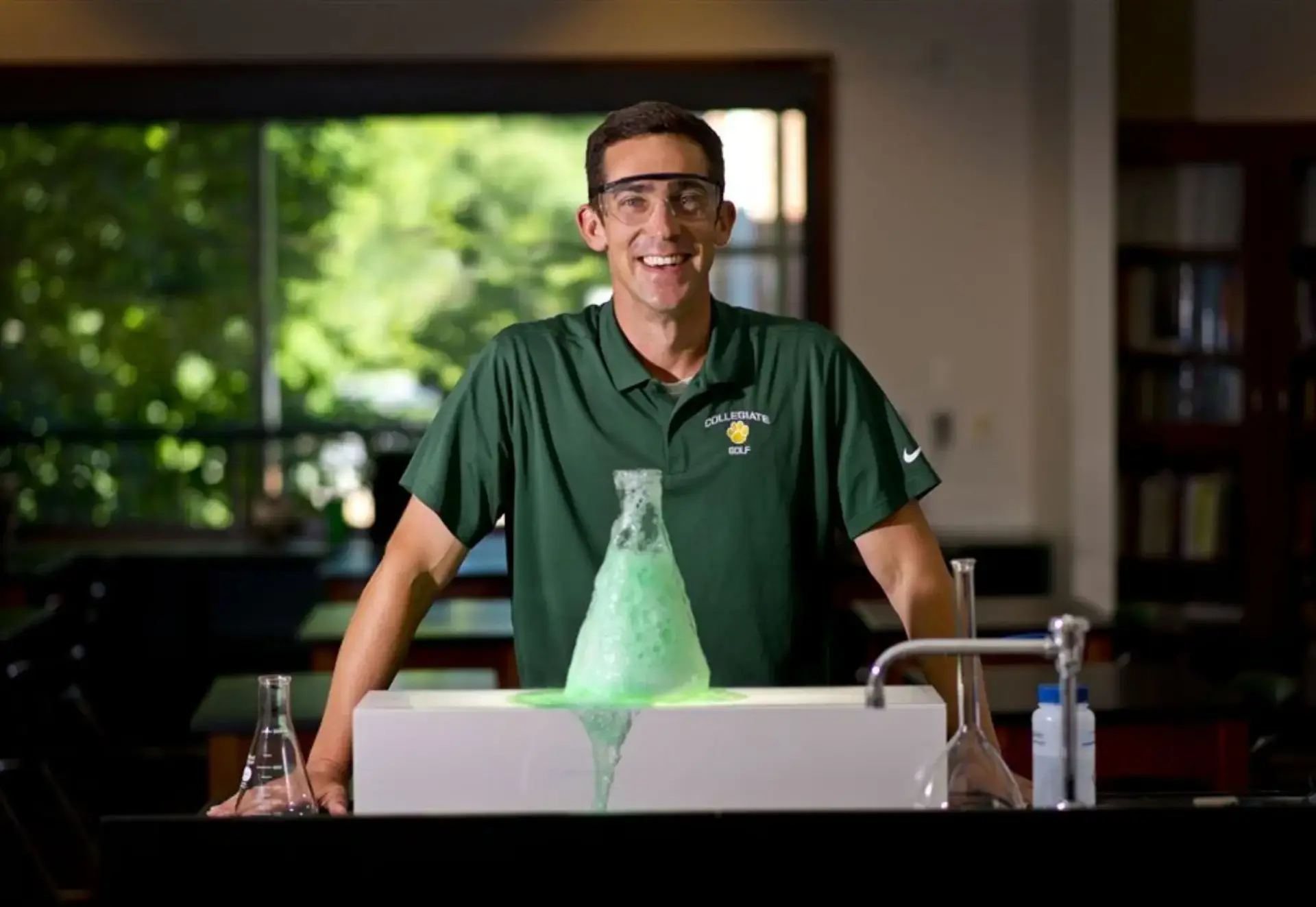 Matt Togna in the science lab wearing safety goggles