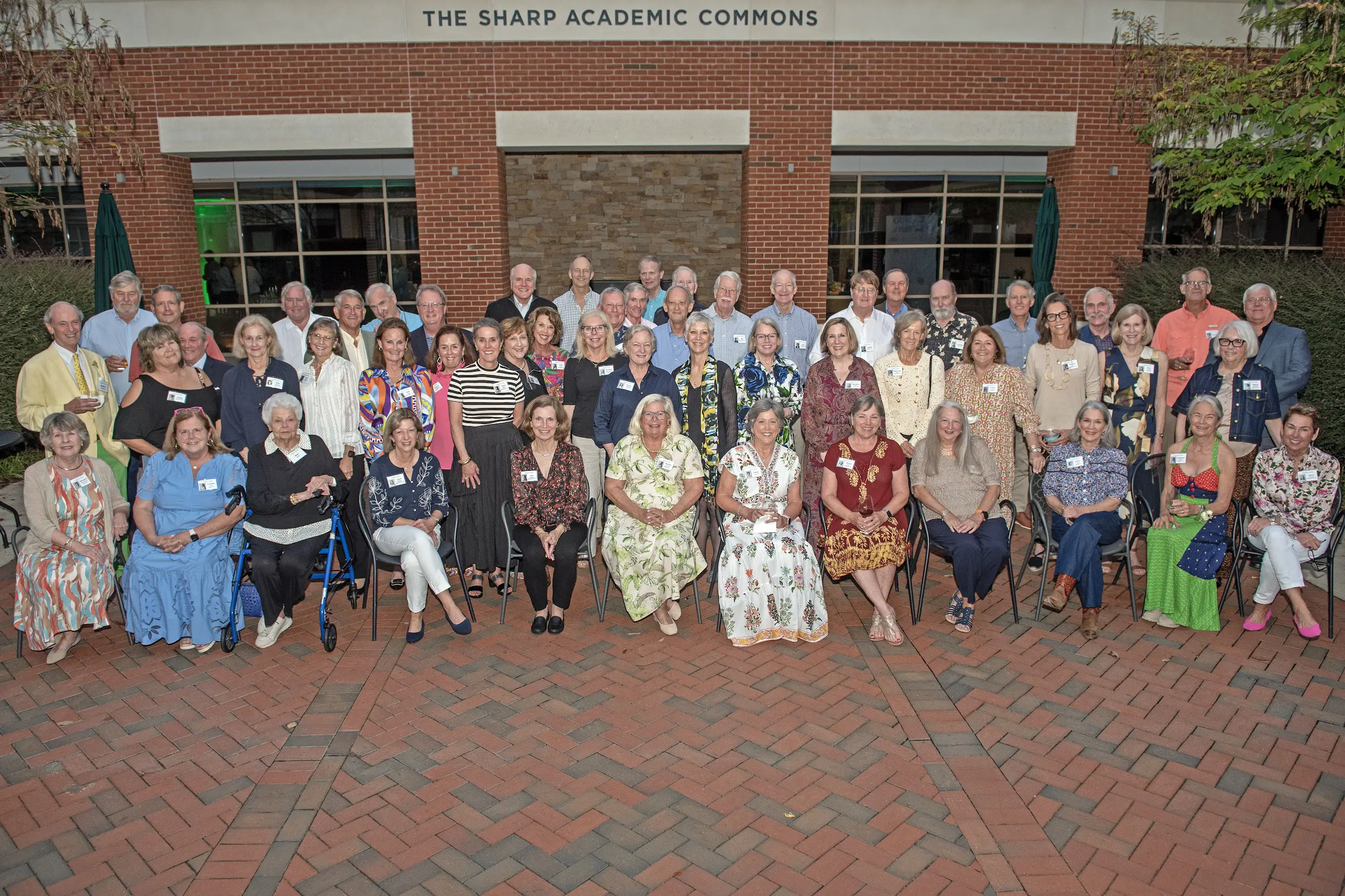 Group photo of alumni smiling