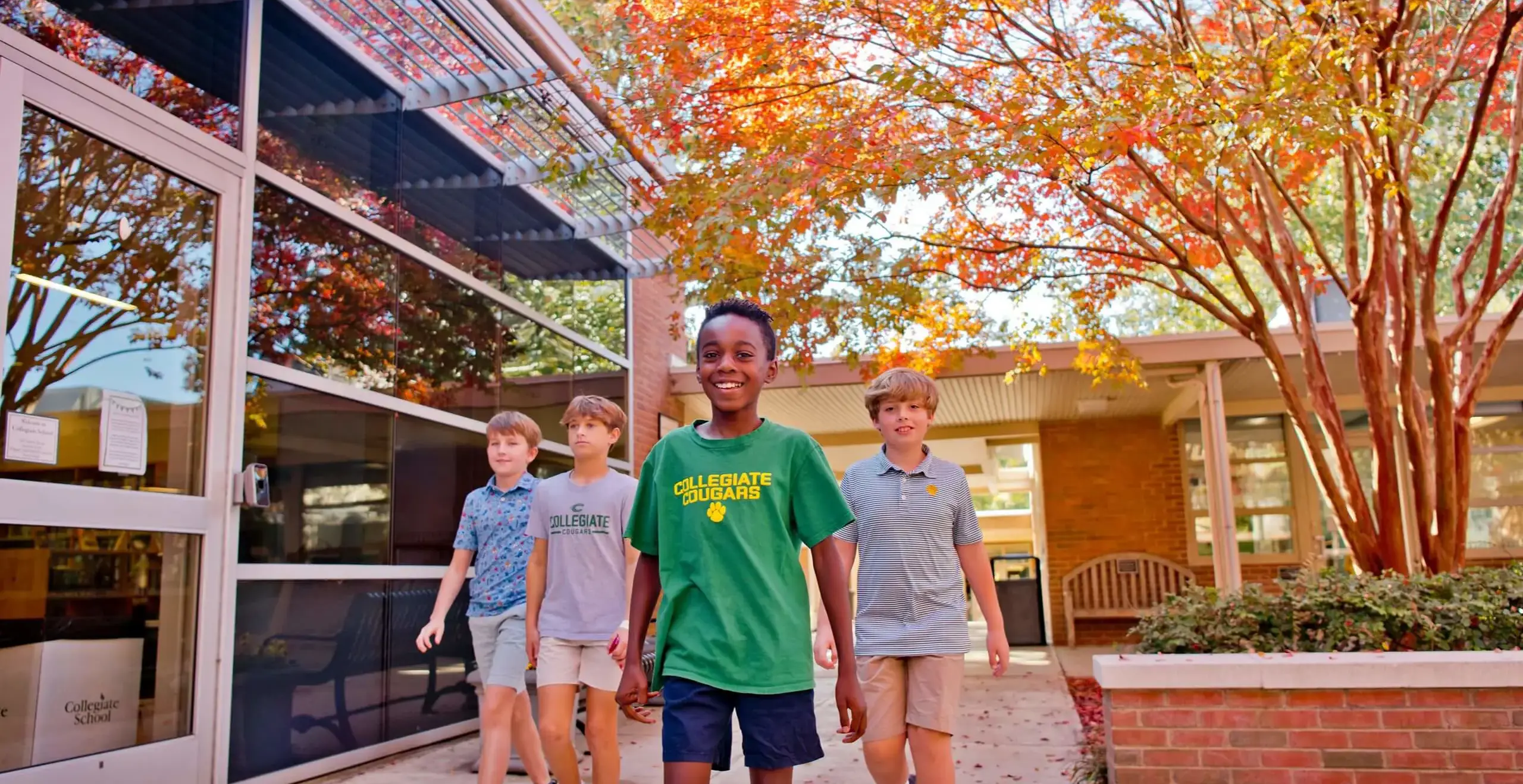 students walking across campus