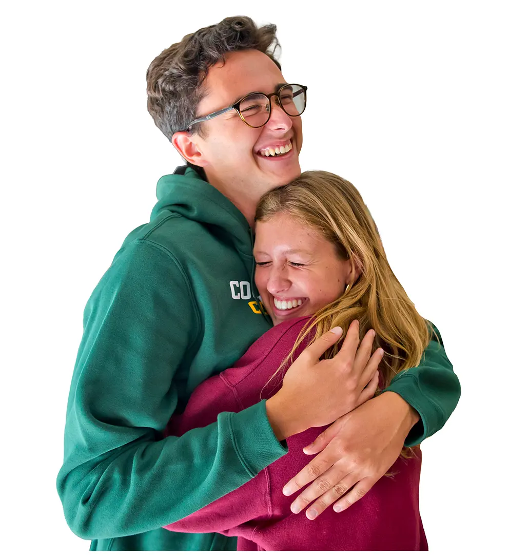 students hugging